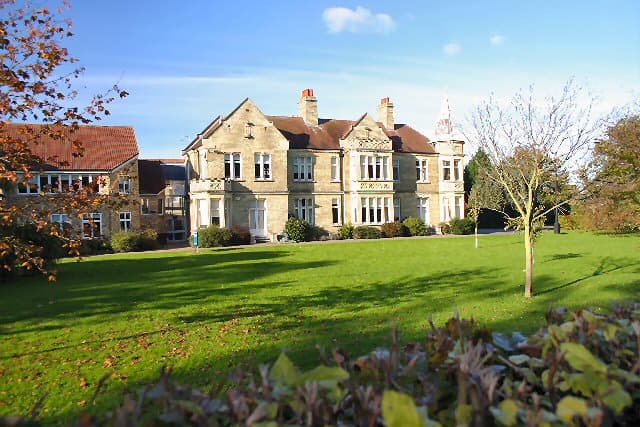 Soham Village College, near to Soham, Cambridgeshire, Great Britain. This is the main building of Soham Village College, a state secondary school. It was the home of Charles Moreby and built in 1901. The school moved there in 1925 having originated in 1686. The school is comprised of several buildings on two adjacent sites.