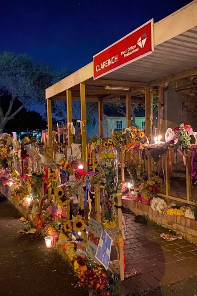Flowers outside Clareinch Post Office in Claremont, Cape Town a year after the death of Uyinene Mrwetyana.