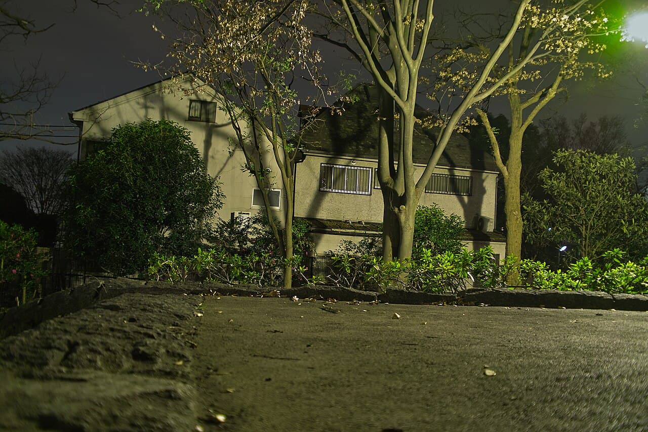 The former Miyazawa family home beside Soshigaya Park at night